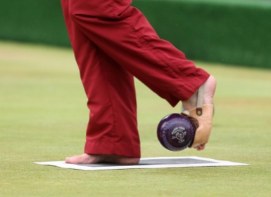 English bowler Bob Love practices at the Kelningrove Lawn Bowls Centre ahead of his Open Triples match tomorrow in the Para-Sport Open Triples B6/B7/B8 round 1 match, Bob uses his feet to play with after he was born without arms, during the 2014 Commonwealth Games in Glasgow. PRESS ASSOCIATION Photo. Picture date: Sunday July 27, 2014. See PA story COMMONWEALTH . Photo credit should read: Andrew Milligan/PA Wire. RESTRICTIONS: Editorial use only. No commercial use. No video emulation.